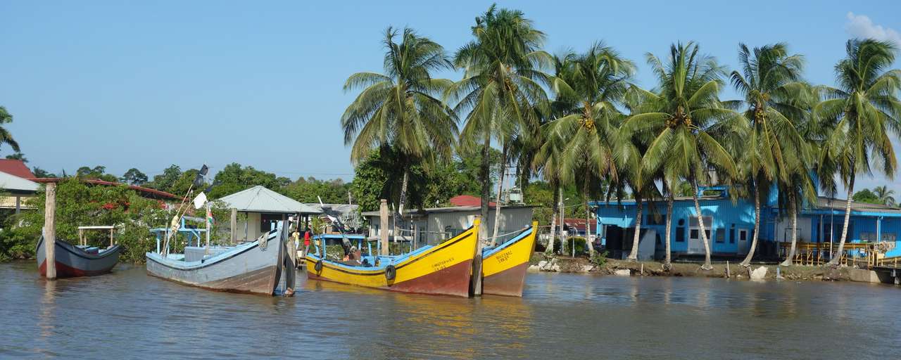 Rondreis Suriname Surinamerivier lokale boten